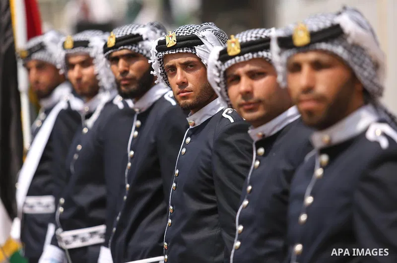 Palestinian policemen take part in a graduation ceremony, in Gaza City on July 17, 2017. Photo by Ashraf Amra