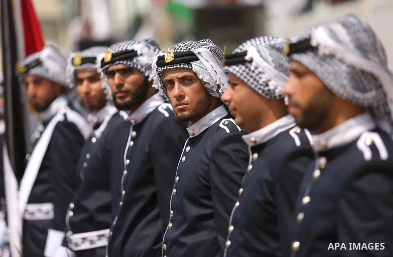 Palestinian policemen take part in a graduation ceremony, in Gaza City on July 17, 2017. Photo by Ashraf Amra