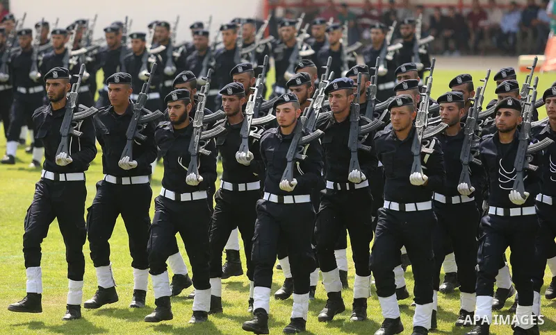 Palestinian policemen take part in a graduation ceremony, in Gaza City on July 17, 2017. Photo by Ashraf Amra