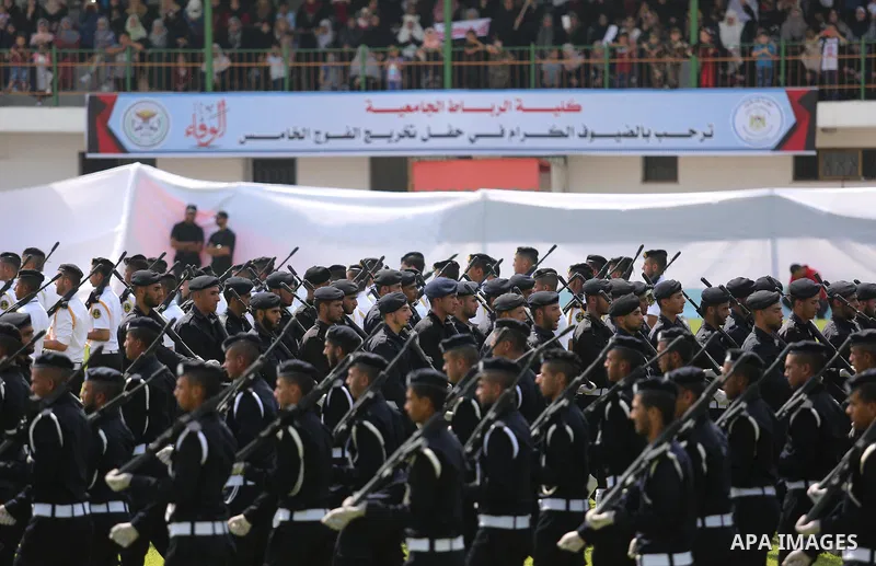 Palestinian policemen take part in a graduation ceremony, in Gaza City on July 17, 2017. Photo by Ashraf Amra
