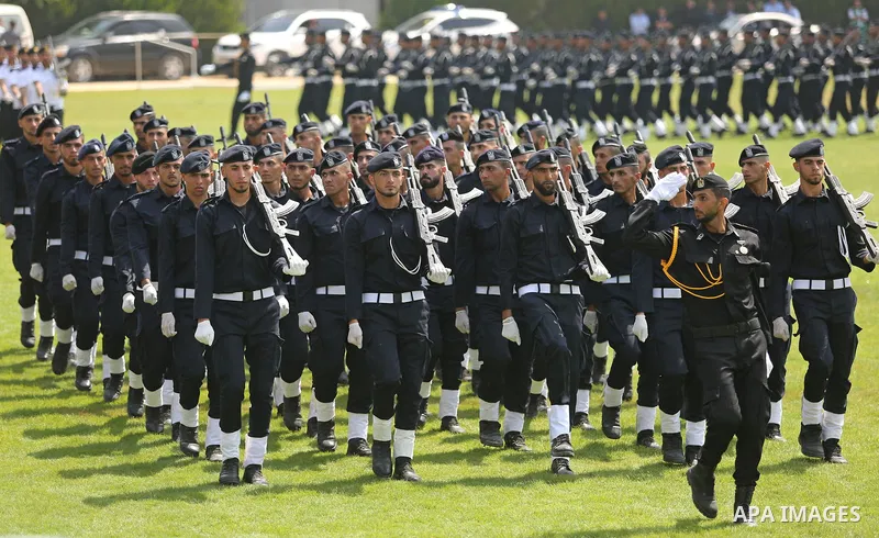 Palestinian policemen take part in a graduation ceremony, in Gaza City on July 17, 2017. Photo by Ashraf Amra