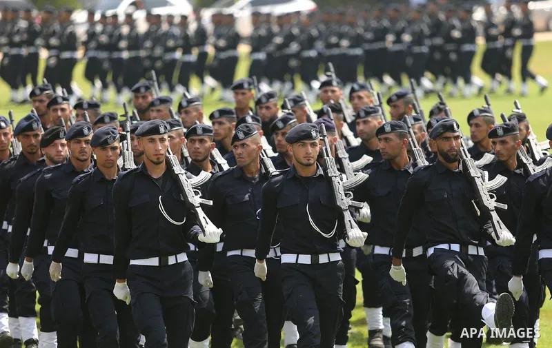 Palestinian policemen take part in a graduation ceremony, in Gaza City on July 17, 2017. Photo by Ashraf Amra