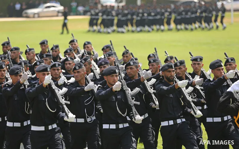 Palestinian policemen take part in a graduation ceremony, in Gaza City on July 17, 2017. Photo by Ashraf Amra