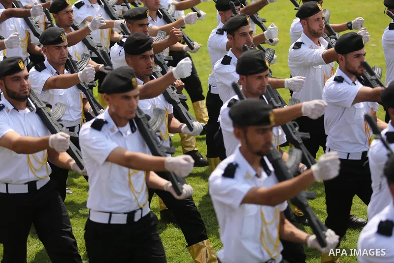 Palestinian policemen take part in a graduation ceremony, in Gaza City on July 17, 2017. Photo by Ashraf Amra