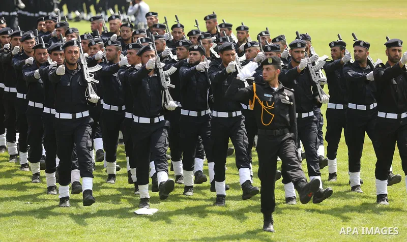 Palestinian policemen take part in a graduation ceremony, in Gaza City on July 17, 2017. Photo by Ashraf Amra