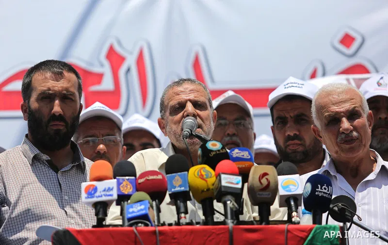 Palestinians take part in a protest against the recent closure of the Al-Aqsa Mosque compound by Israel and Israeli blockade on Gaza strip, in Gaza City on July 18, 2017. Photo by Ashraf Amra
