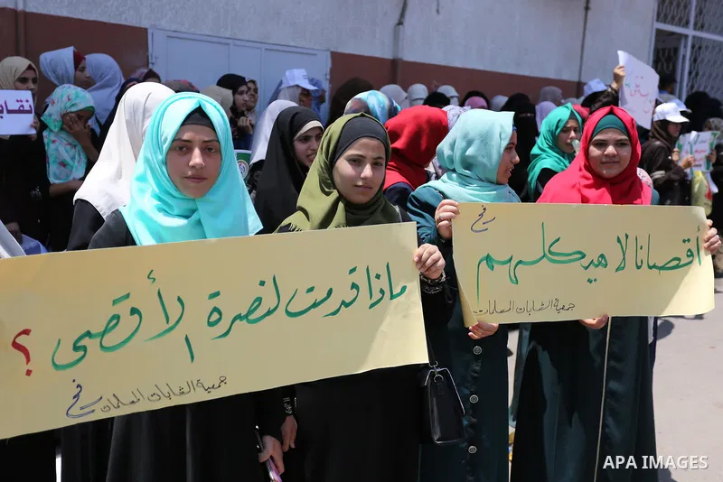 Palestinians take part in a protest against the recent closure of the Al-Aqsa Mosque compound by Israel and Israeli blockade on Gaza strip, in Gaza City on July 18, 2017. Photo by Ashraf Amra