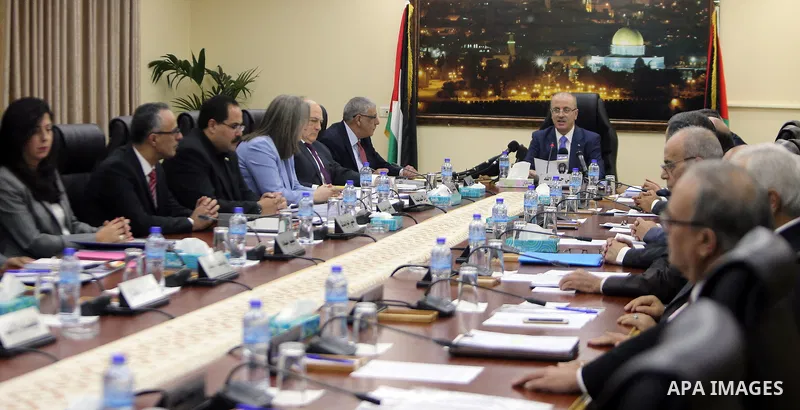 Palestinian Prime Minister, Rami Hamdallah, chairs a meeting of council ministers, in the West Bank city of Ramallah, on July 18, 2017. Photo by Prime Minister Office
