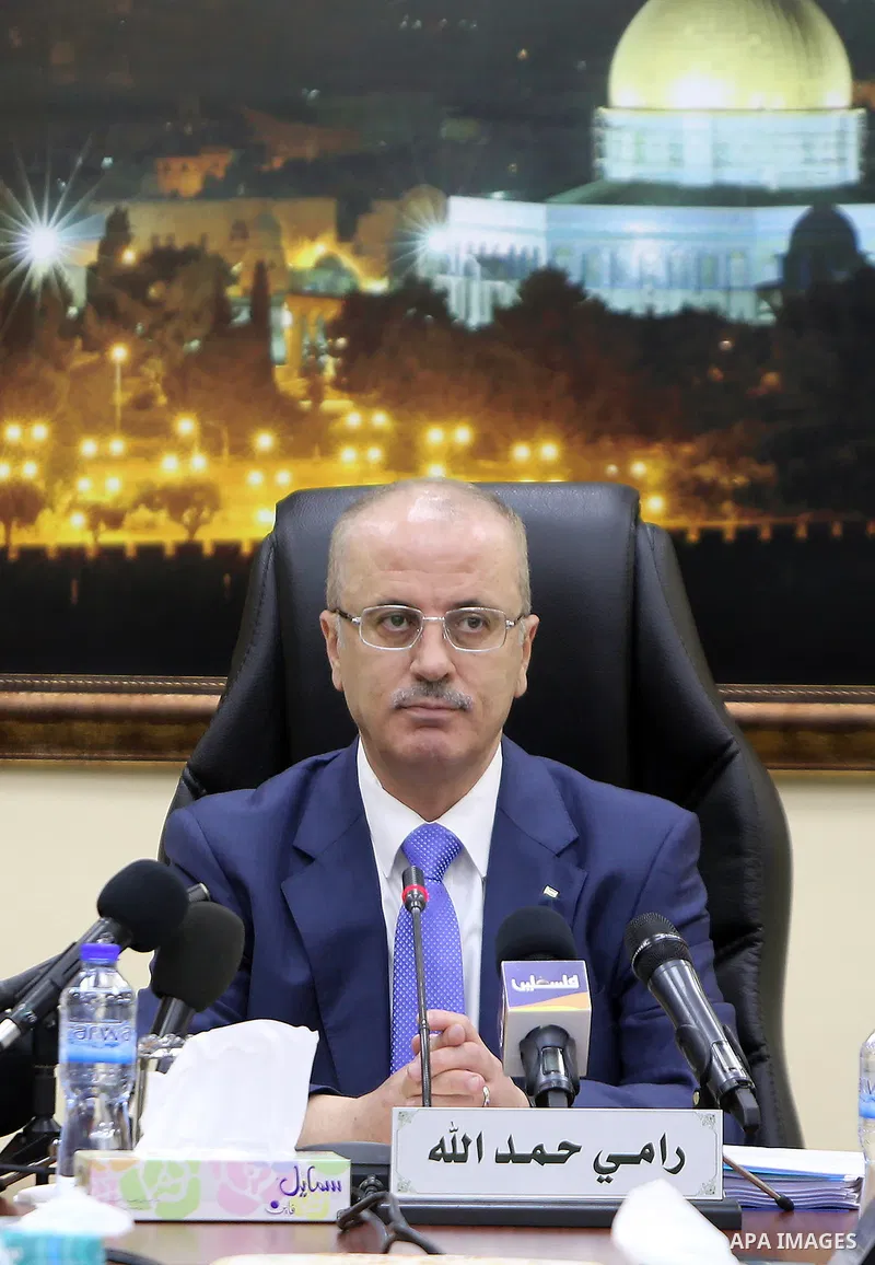 Palestinian Prime Minister, Rami Hamdallah, chairs a meeting of council ministers, in the West Bank city of Ramallah, on July 18, 2017. Photo by Prime Minister Office