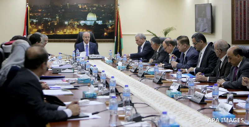 Palestinian Prime Minister, Rami Hamdallah, chairs a meeting of council ministers, in the West Bank city of Ramallah, on July 18, 2017. Photo by Prime Minister Office