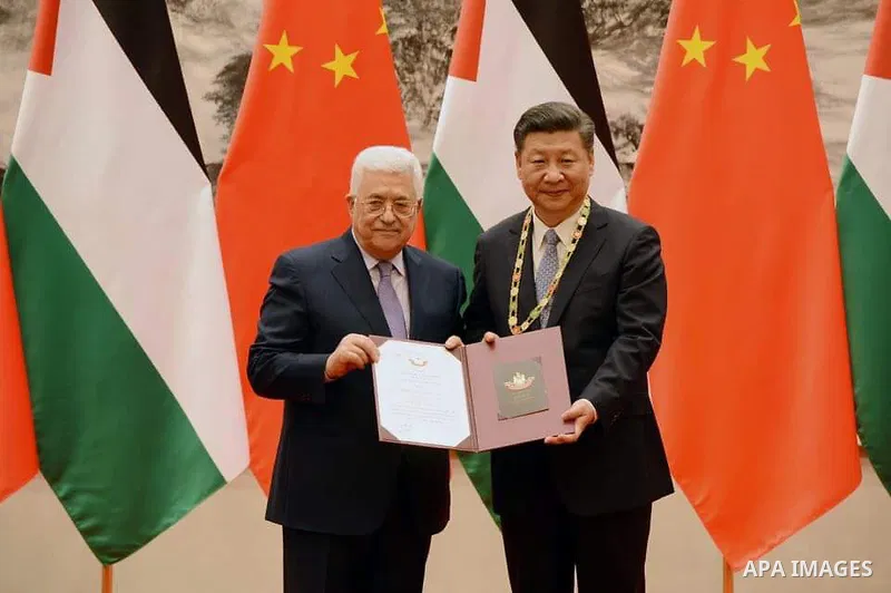 Palestinian president Mahmud Abbas meets with Chinese President Xi Jinping at the Great Hall of the People in Beijing, China, on July 18, 2017. Abbas is on an official visit to China from July 17-20. Photo by Thaer Ganai...