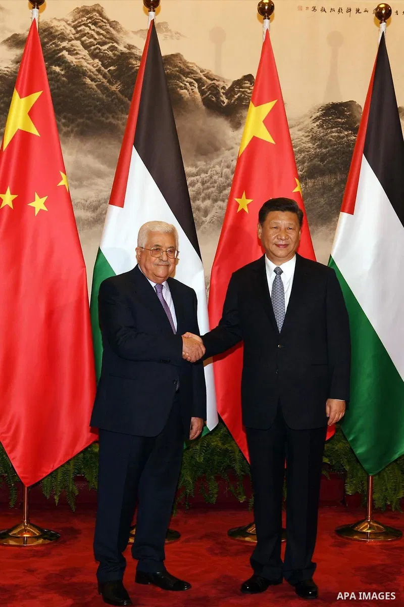 Palestinian President Mahmoud Abbas, shakes hands Chinese President Xi Jinping, during a signing ceremony at the Great Hall of the People in Beijing, China, on July 18, 2017. Abbas is on an official visit to China from J...