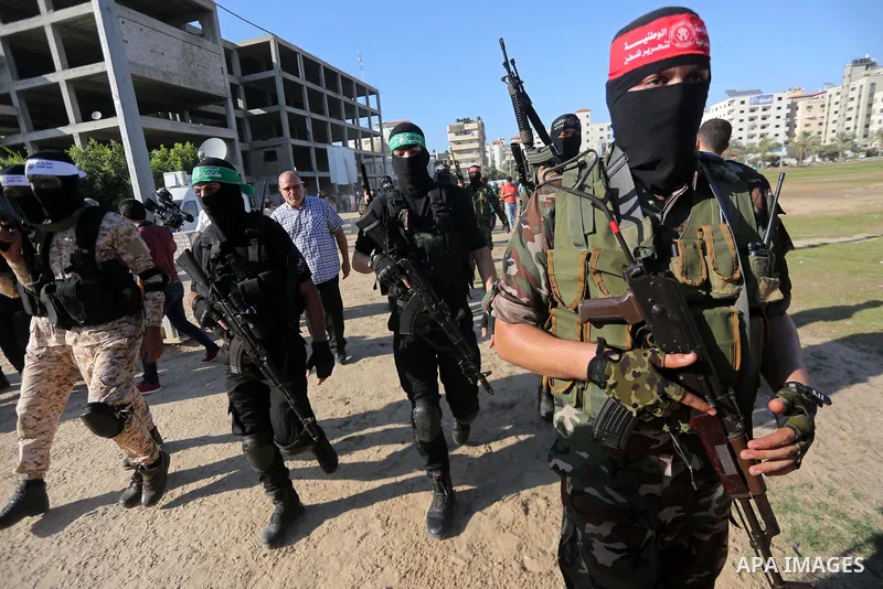 Palestinian militants from different local factions arrive to hold a press conference to refuse closure of the Al-Aqsa Mosque compound by Israel in Gaza City on July 18, 2017. Photo by Mohammed Asad