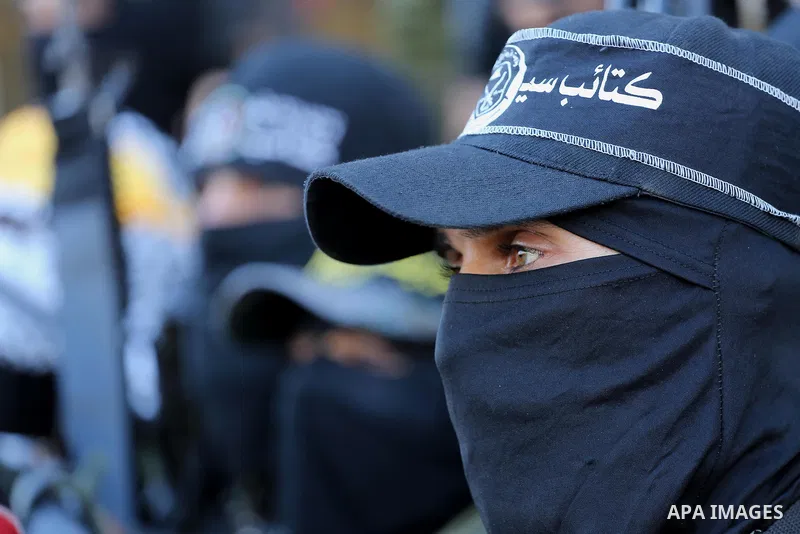 Palestinian militants from different local factions hold a press conference to refuse closure of the Al-Aqsa Mosque compound by Israel in Gaza City on July 18, 2017. Photo by Mohammed Asad