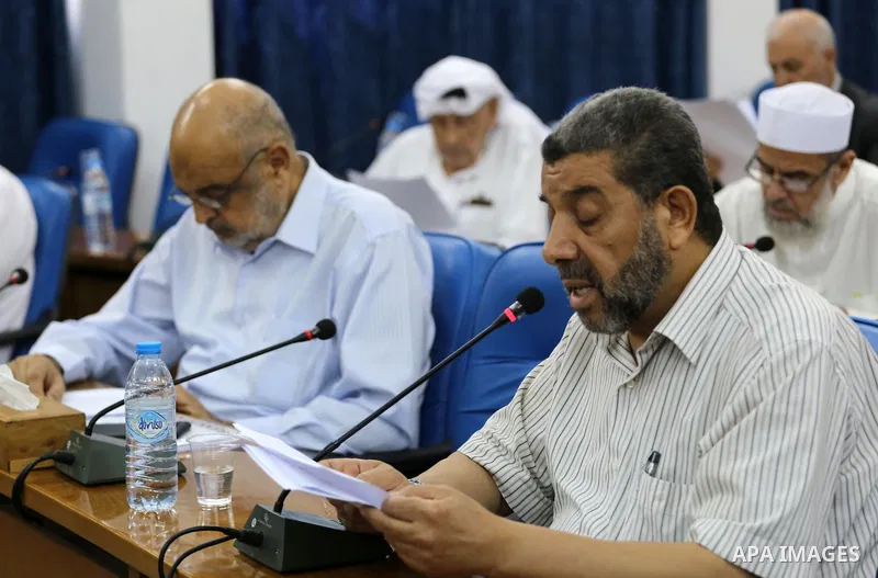 Members of the Palestinian legislative council from Hamas movement attend a meeting at the legislative council in Gaza City on July 19, 2017. Photo by Mohammed Asad