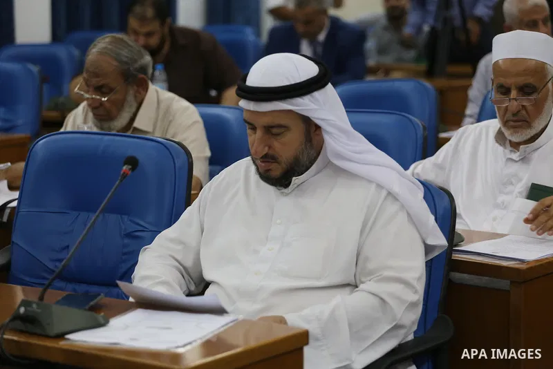 Members of the Palestinian legislative council from Hamas movement attend a meeting at the legislative council in Gaza City on July 19, 2017. Photo by Mohammed Asad