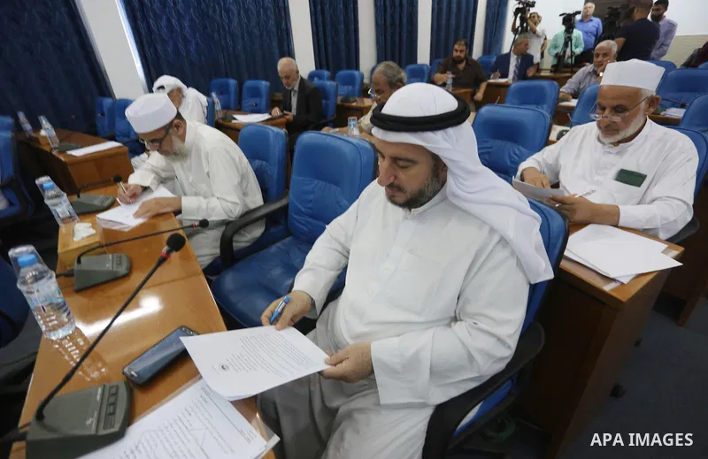 Members of the Palestinian legislative council from Hamas movement attend a meeting at the legislative council in Gaza City on July 19, 2017. Photo by Mohammed Asad