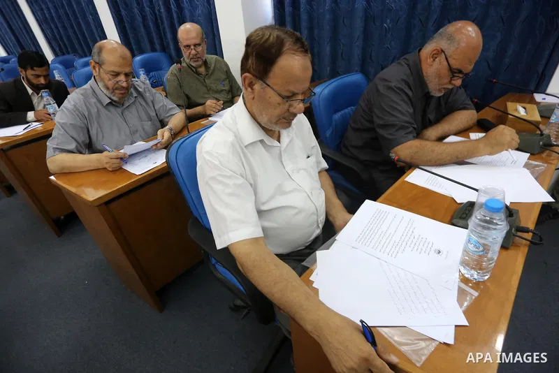 Members of the Palestinian legislative council from Hamas movement attend a meeting at the legislative council in Gaza City on July 19, 2017. Photo by Mohammed Asad
