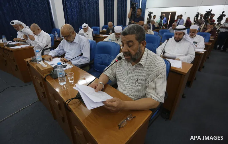 Members of the Palestinian legislative council from Hamas movement attend a meeting at the legislative council in Gaza City on July 19, 2017. Photo by Mohammed Asad