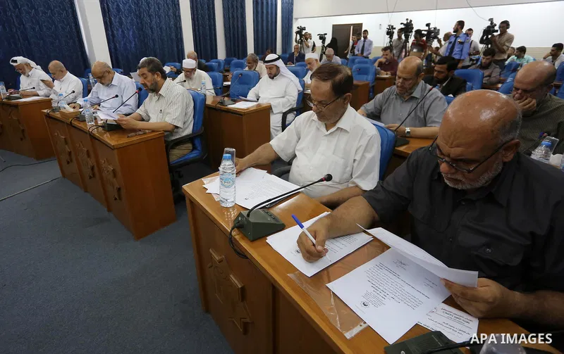 Members of the Palestinian legislative council from Hamas movement attend a meeting at the legislative council in Gaza City on July 19, 2017. Photo by Mohammed Asad