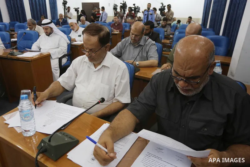 Members of the Palestinian legislative council from Hamas movement attend a meeting at the legislative council in Gaza City on July 19, 2017. Photo by Mohammed Asad