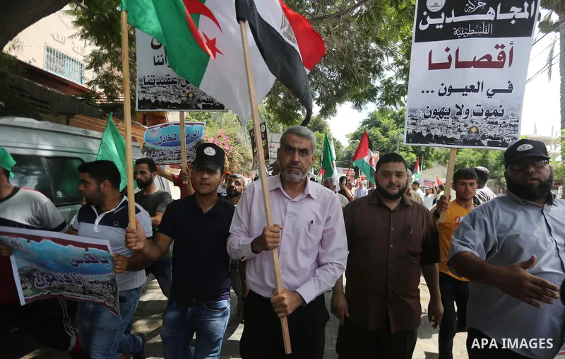 Palestinians take part in a protest against the recent closure of the Al-Aqsa Mosque compound by Israel, in Gaza City on July 19, 2017. Photo by Mohammed Asad