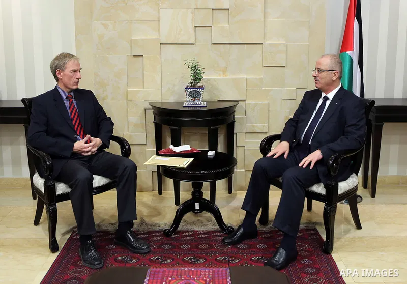 Palestinian Prime Minister Rami Hamdallah meets with German Representative to Palestine Peter Perverth, at his office in the West Bank city of Ramallah on July 19, 2017. Photo by Prime Minister Office