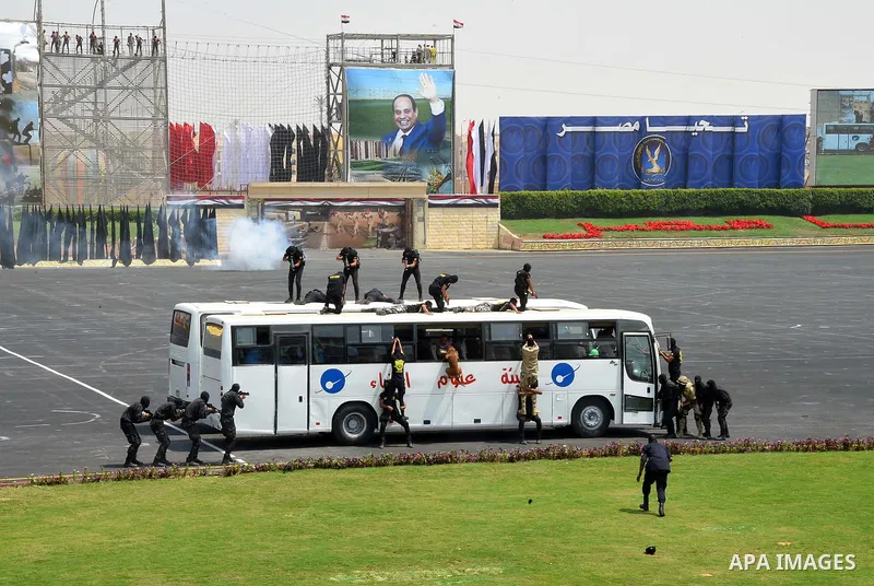 Egyptian police officers demonstrate their skills during their graduation ceremony at the police academy in Cairo, Egypt July 19, 2017. Photo by Egyptian President Office