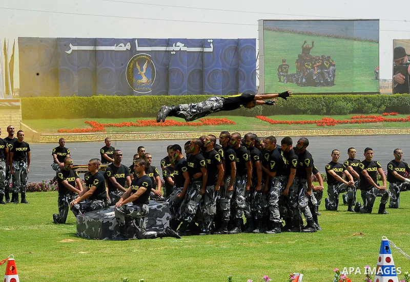 Egyptian police officers demonstrate their skills during their graduation ceremony at the police academy in Cairo, Egypt July 19, 2017. Photo by Egyptian President Office