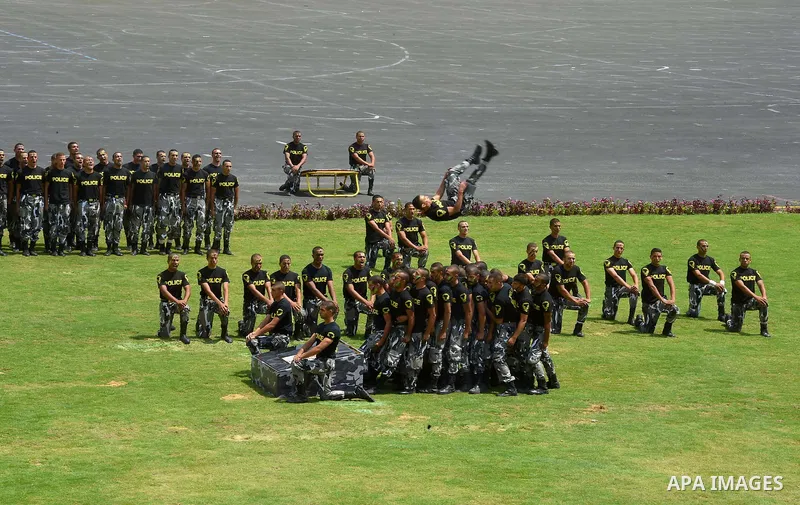 Egyptian police officers demonstrate their skills during their graduation ceremony at the police academy in Cairo, Egypt July 19, 2017. Photo by Egyptian President Office