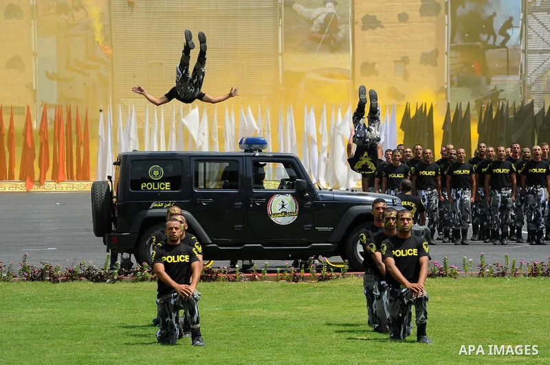 Egyptian police officers demonstrate their skills during their graduation ceremony at the police academy in Cairo, Egypt July 19, 2017. Photo by Egyptian President Office