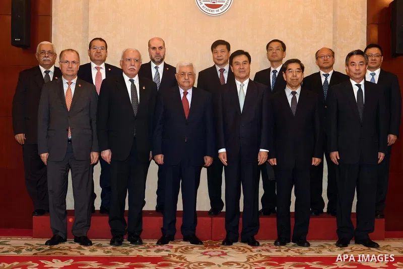 Chinese Academy of Governance honors Palestinian President Mahmoud Abbas in Beijing, China, on July 19, 2017. Abbas is on an official visit to China from July 17-20. Photo by Thaer Ganaim