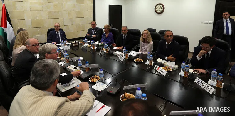 Palestinian Prime minister Rami Hamadallah meets with a mbassadors, consuls and representatives of the European Union, in the West Bank city of Ramallah,on July 20, 2017. Photo by Prime Minister Office