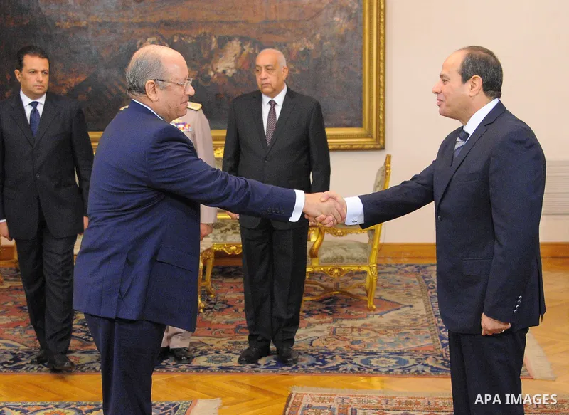 Egyptian President Abdel-Fattah el-Sisi, listens to the new head of the State Council during a swearing, in Cairo, Egypt, on July 20, 2017. Photo by Egyptian President Office