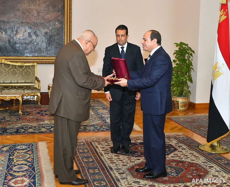 Egyptian President Abdel-Fattah el-Sisi, listens to the new head of the State Council during a swearing, in Cairo, Egypt, on July 20, 2017. Photo by Egyptian President Office