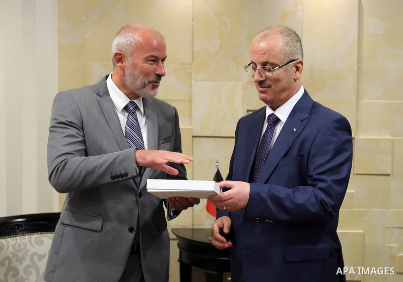 Palestinian Prime minister Rami Hamadallah meets with a Belgian consul, in the West Bank city of Ramallah,on July 20, 2017. Photo by Prime Minister Office