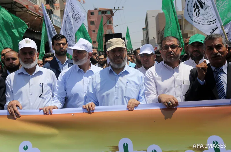 Hamas Chief Ismail Haniyeh takes part during a protest against Israel's newly-installed security measures at the entrance to the al-Aqsa mosque compound in Gaza city on July 21, 2017. Photo by Mohammed Asad