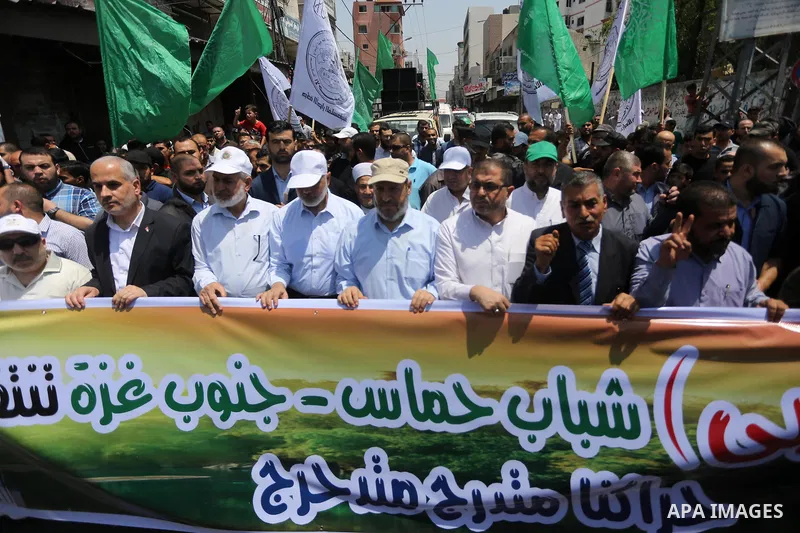 Hamas Chief Ismail Haniyeh takes part during a protest against Israel's newly-installed security measures at the entrance to the al-Aqsa mosque compound in Gaza city on July 21, 2017. Photo by Mohammed Asad