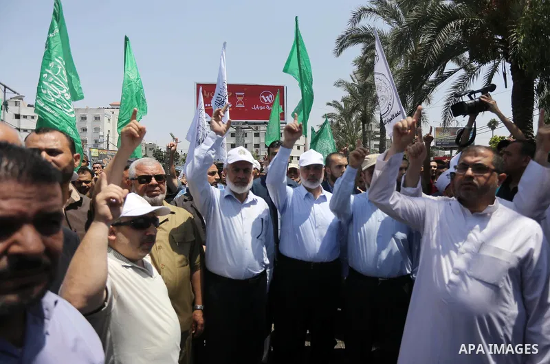 Hamas Chief Ismail Haniyeh takes part during a protest against Israel's newly-installed security measures at the entrance to the al-Aqsa mosque compound in Gaza city on July 21, 2017. Photo by Mohammed Asad