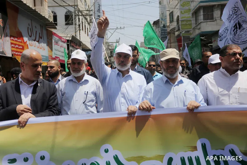 Hamas Chief Ismail Haniyeh takes part during a protest against Israel's newly-installed security measures at the entrance to the al-Aqsa mosque compound in Gaza city on July 21, 2017. Photo by Mohammed Asad