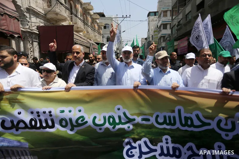 Hamas Chief Ismail Haniyeh takes part during a protest against Israel's newly-installed security measures at the entrance to the al-Aqsa mosque compound in Gaza city on July 21, 2017. Photo by Mohammed Asad