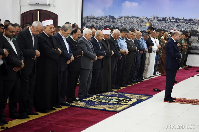 Palesitnian President Mahmoud Abbas attends Friday prayer at his headquarter in the West Bank city of Ramallah, on July 21, 2017. Photo by Thaer Ganaim