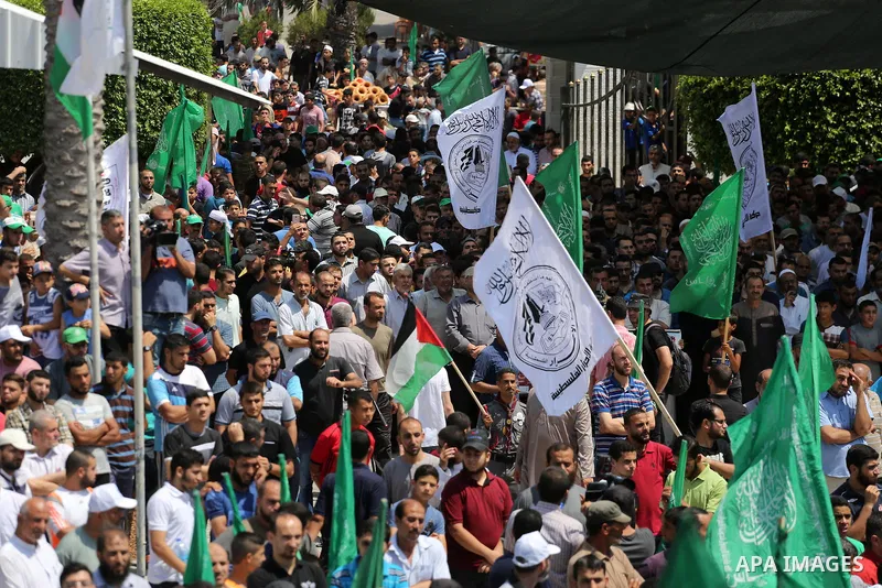 Palestinian demonstrators take part during a protest against Israel's new security measures at the entrance to the al-Aqsa mosque compound, which include metal detectors and cameras, in Gaza City on July 21, 2017. Photo...
