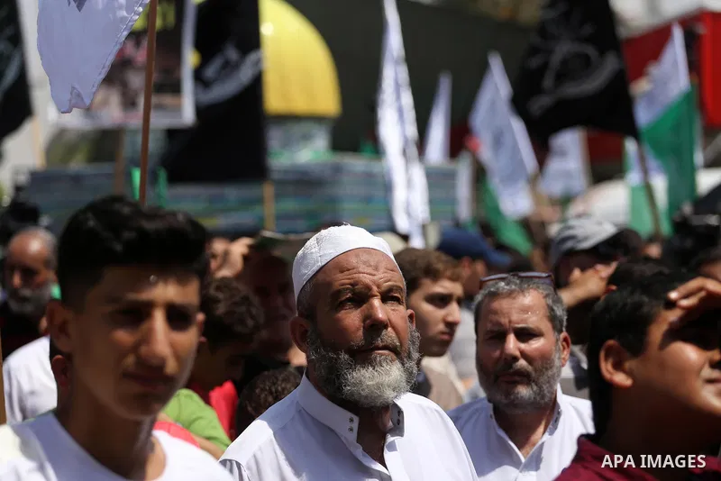 Palestinian demonstrators take part during a protest against Israel's new security measures at the entrance to the al-Aqsa mosque compound, which include metal detectors and cameras, in Gaza City on July 21, 2017. Photo...