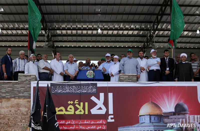 Senior Hamas leader Khalil al-Hayah speaks during a protest against Israel's new security measures at the entrance to the al-Aqsa mosque compound, which include metal detectors and cameras, in Gaza City on July 21, 2017....