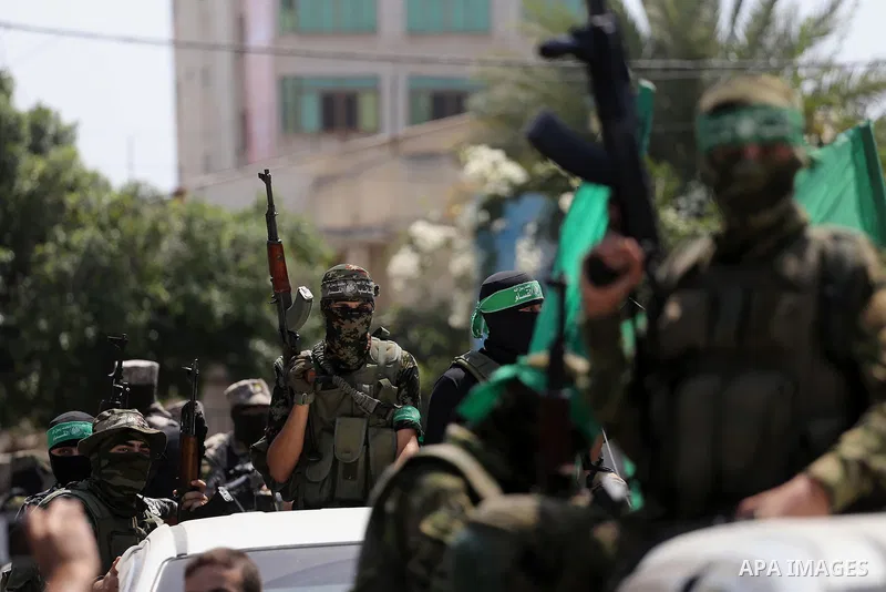 Palestinian Hamas militants take part in a protest against Israel's new security measures at the entrance to the al-Aqsa mosque compound, which include metal detectors and cameras, in Gaza City on July 21, 2017. Photo by...