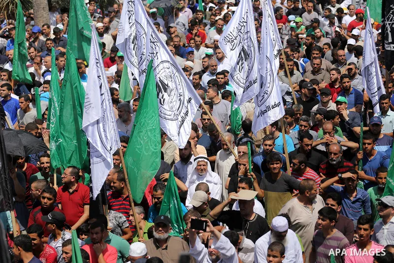 Palestinian demonstrators take part during a protest against Israel's new security measures at the entrance to the al-Aqsa mosque compound, which include metal detectors and cameras, in Gaza City on July 21, 2017. Photo...
