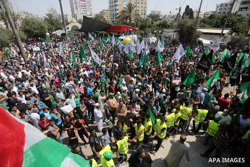 Palestinian demonstrators take part during a protest against Israel's new security measures at the entrance to the al-Aqsa mosque compound, which include metal detectors and cameras, in Gaza City on July 21, 2017. Photo...