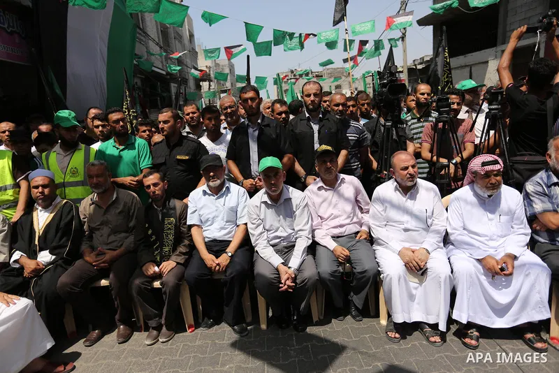 Yahya Sinwar the new leader of the Hamas Islamist movement in the Gaza Strip takes part in a protest against Israel's new security measures at the entrance to the al-Aqsa mosque compound, which include metal detectors an...