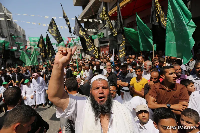 Palestinian demonstrators take part in a protest against Israel's new security measures at the entrance to the al-Aqsa mosque compound, which include metal detectors and cameras, in Khan Younis in the the southern Gaza s...
